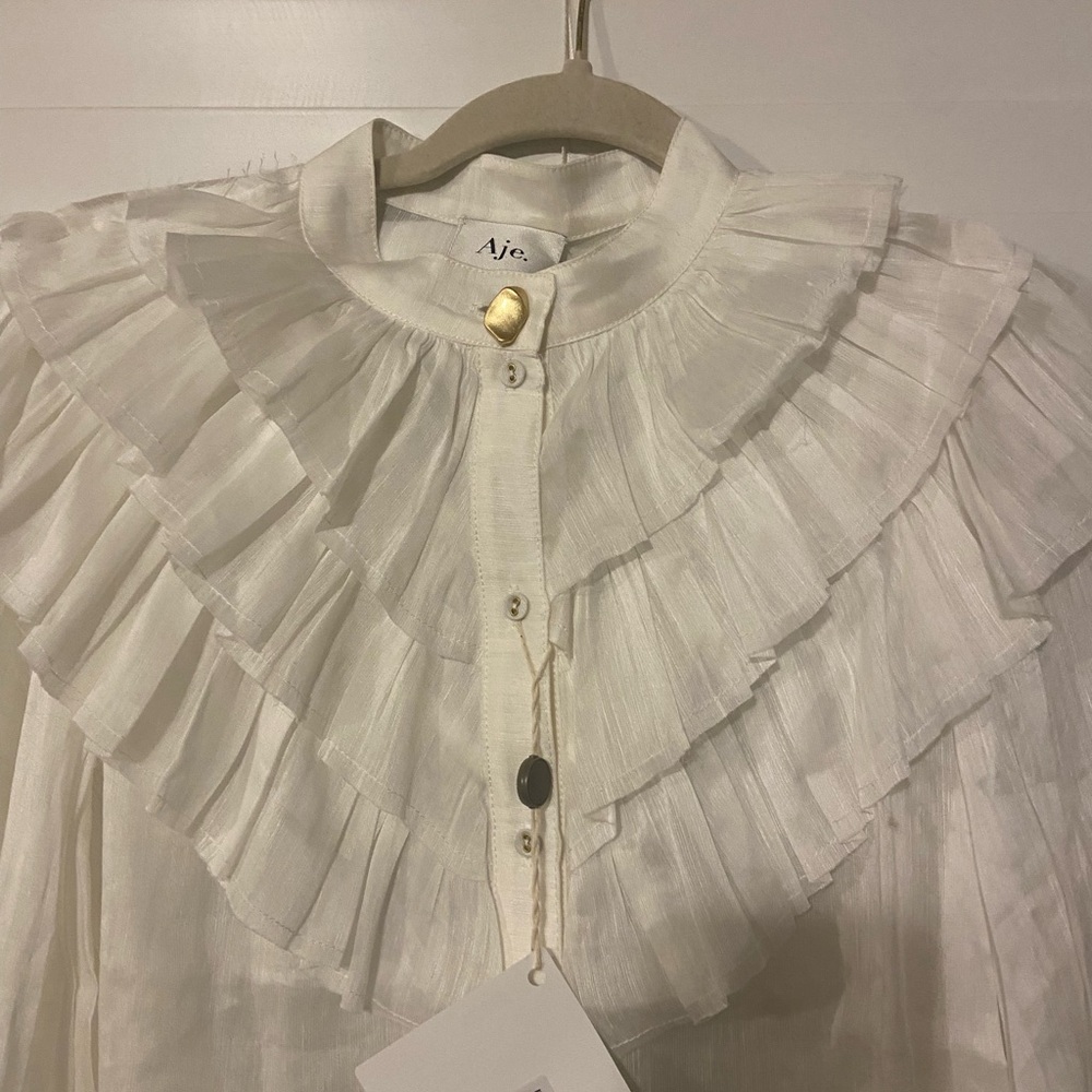 Aje. NWT Serene Ruffled Collar Ivory Blouse